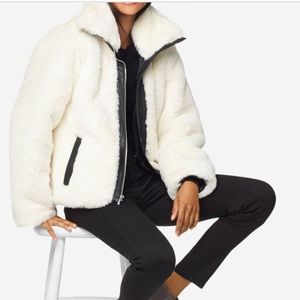 Faux fur jacket with faux leather trim